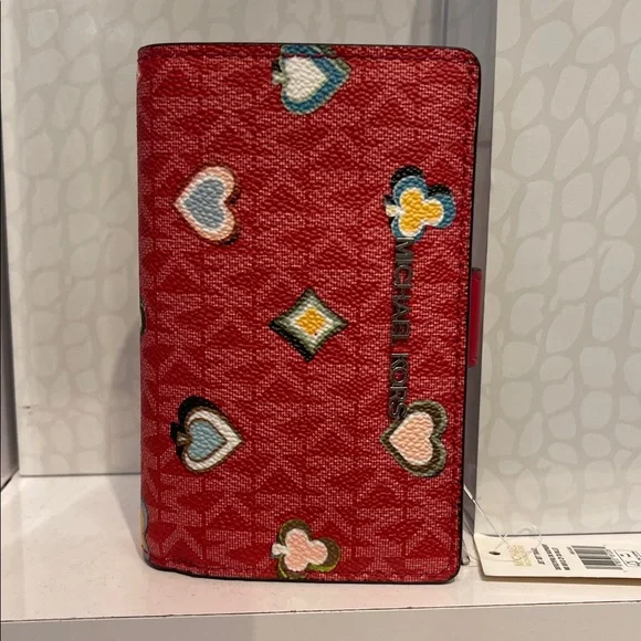 MICHAEL KORS Jet Set Md Printed Signature Logo Bifold Wallet
Dark Raspberry 
NWT - Picture 12 of 16